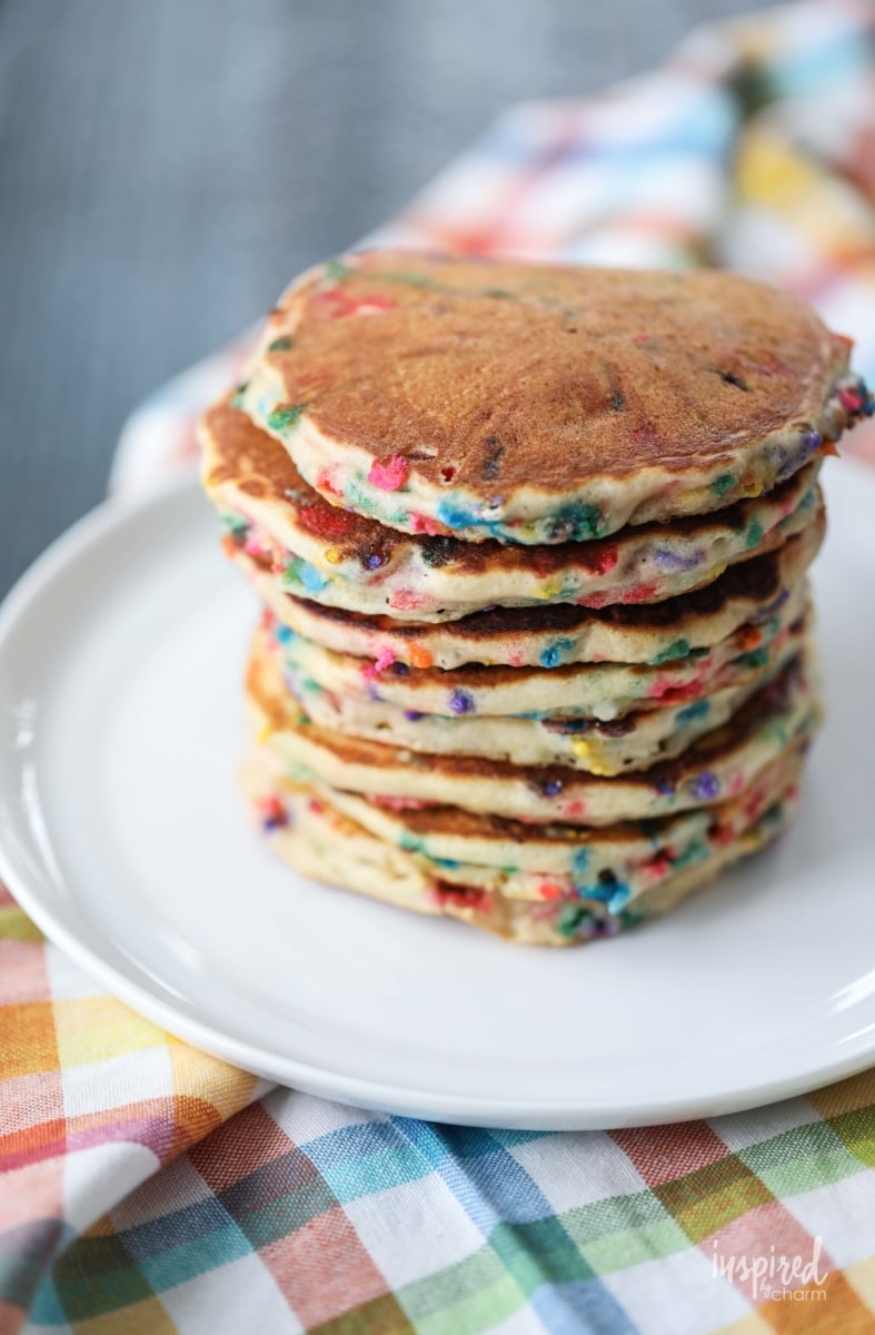 stack of funfetti pancakes on a plate.