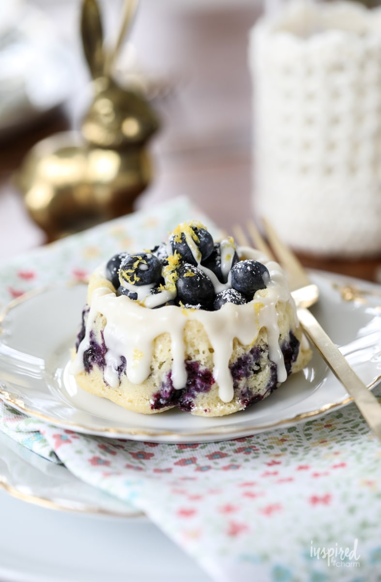 close up of single Blueberry Shortcake on a plate with a fork. 