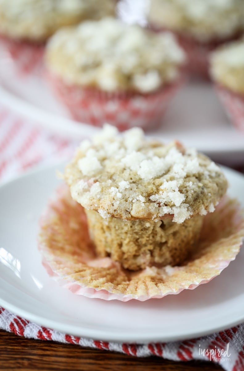 rhubarb muffin with streusel topping on a plate.