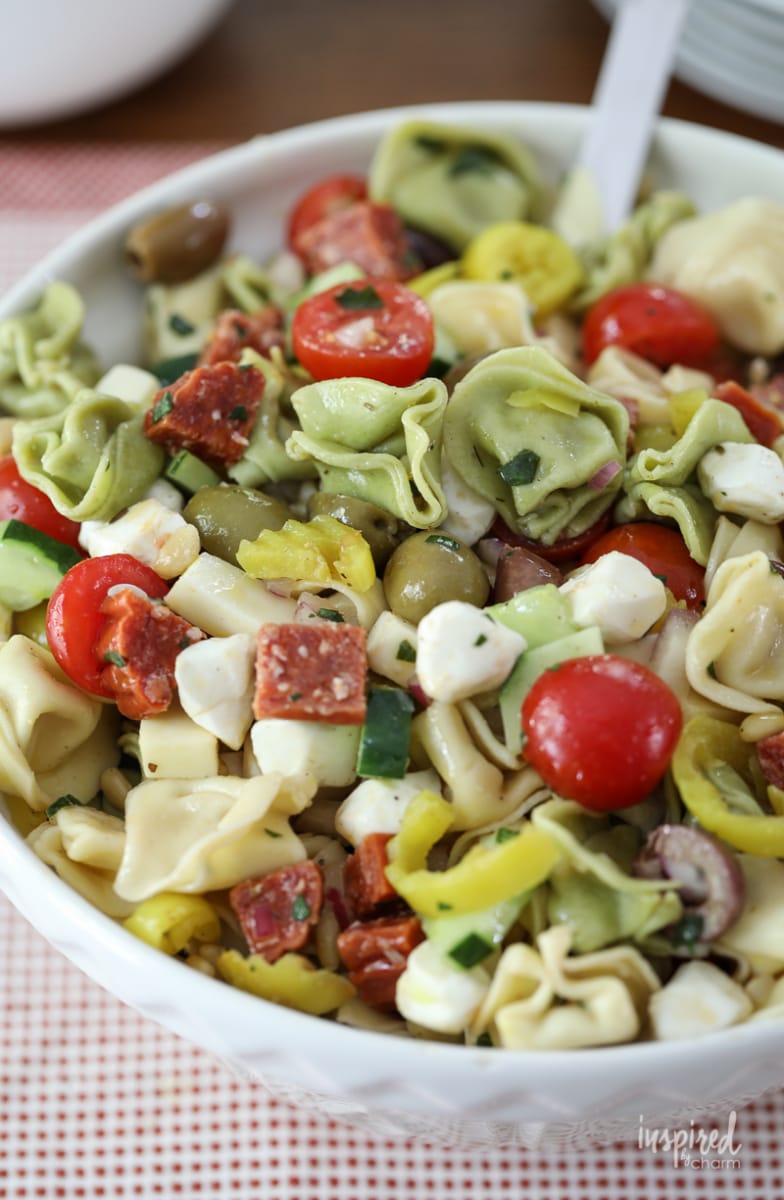 The BEST Tortellini Pasta Salad served in a big bowl. 