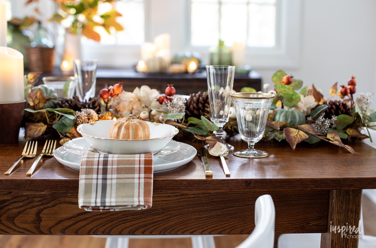 table setting for thanksgiving with vintage glassware and vintage plates.
