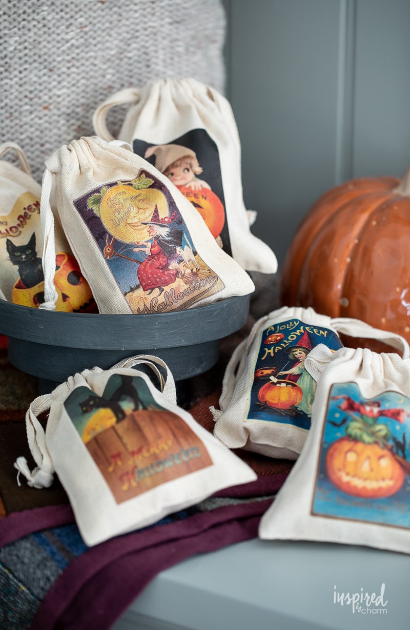 Vintage-Inspired Halloween Treat Bags spread out on a bench.