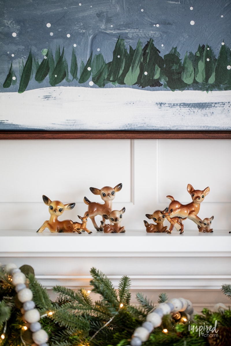 thrifted deer figurines on a mantle