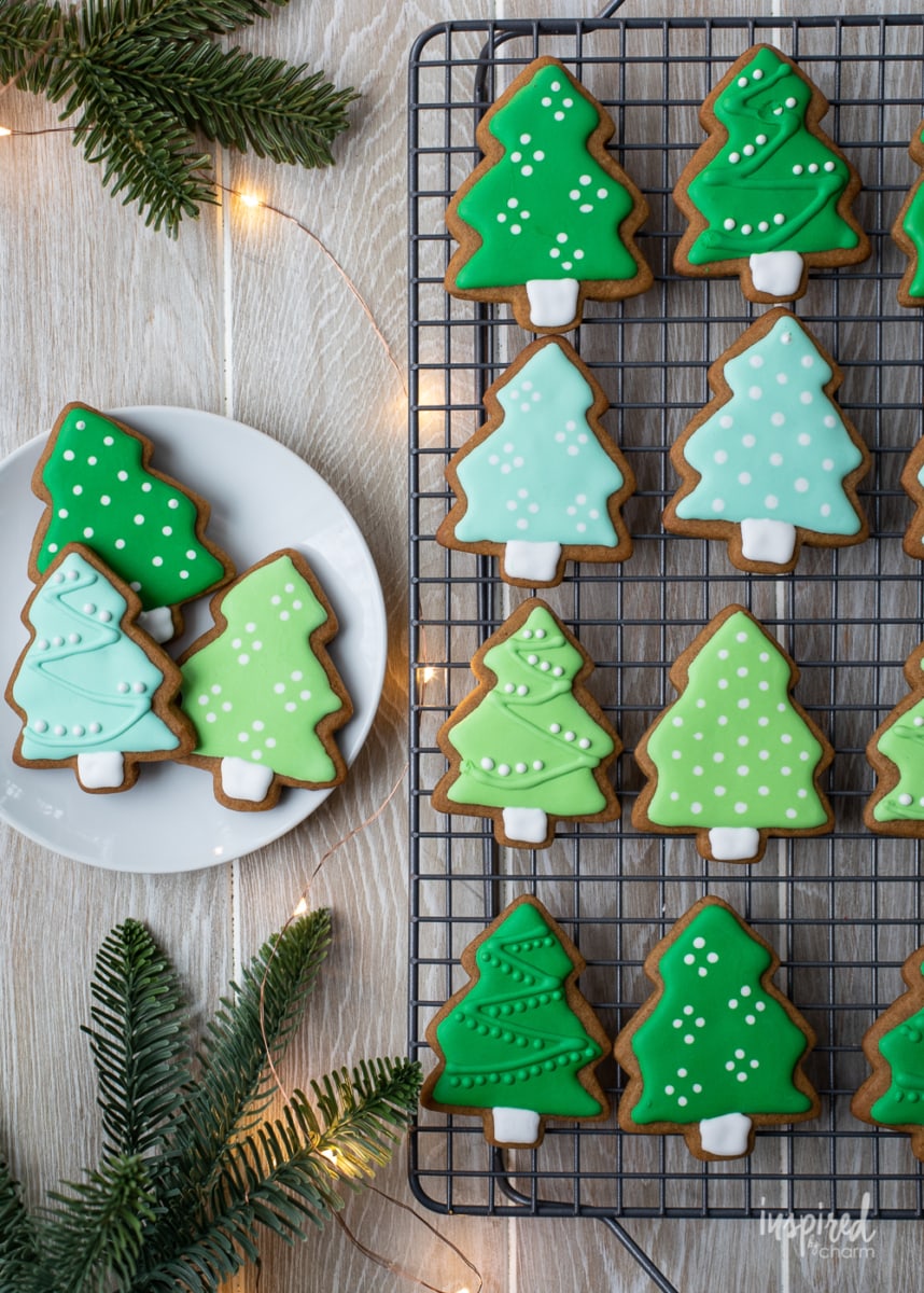 gingerbread cookies shaped and decorated like Christmas trees