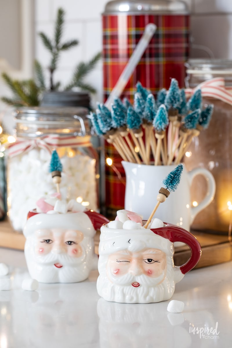 DIY Bottle Brush Drink Stirrers in Santa mugs