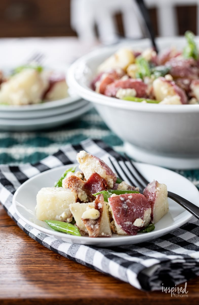 Bacon and Blue Cheese Potato Salad on a plate with a fork.