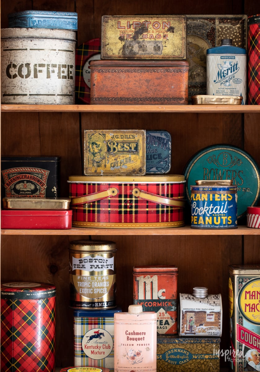 vintage tins on a shelf. 