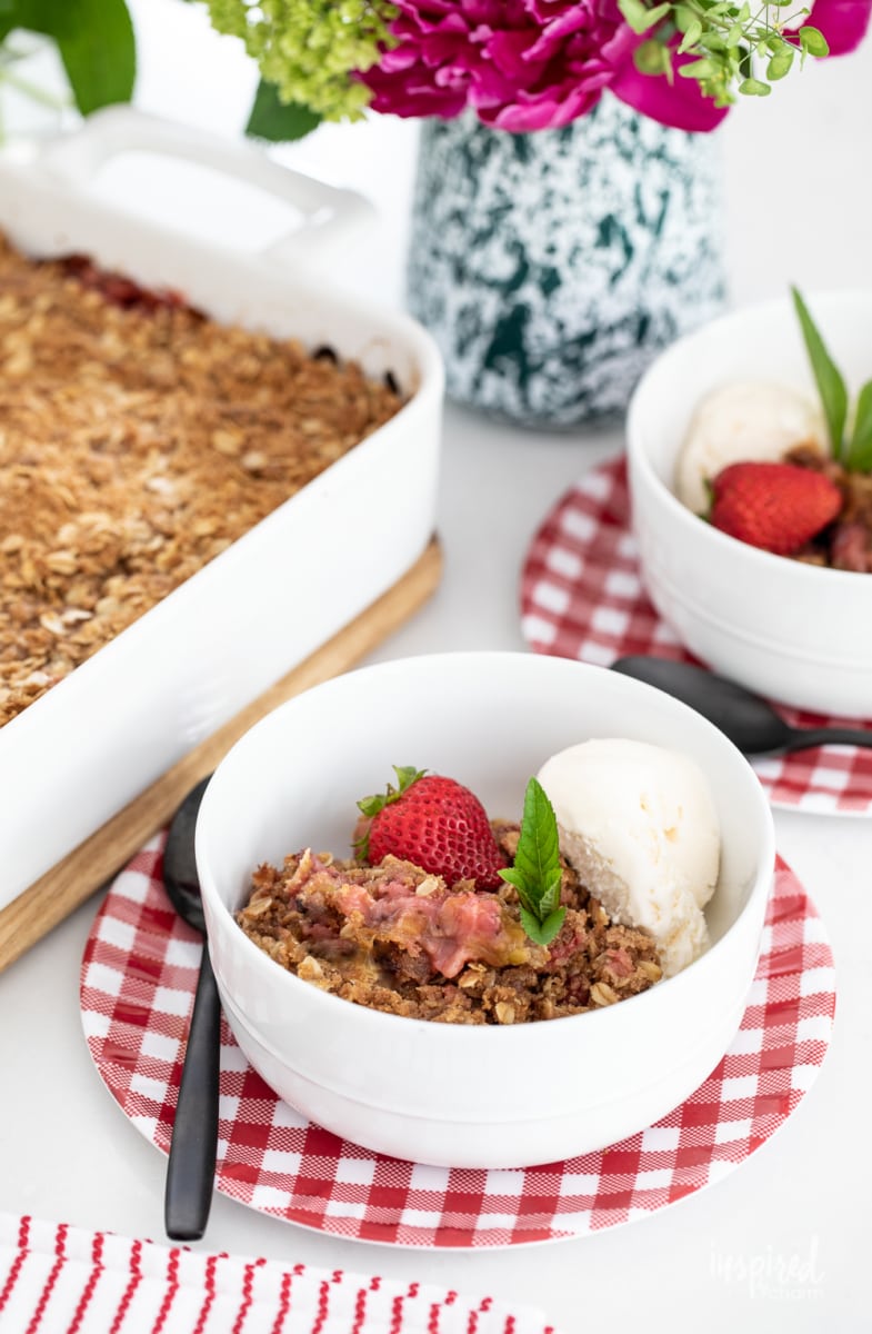 Amazing Strawberry Rhubarb Crisp in a pan and served in a bowl.