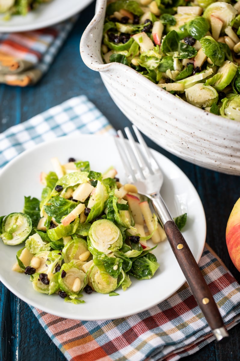 How to Make Shaved Brussels Sprout Salad #BrusselsSprouts #ShavedBrusselsSprouts #salad #apple #pinenuts #recipe #sidedish #easy