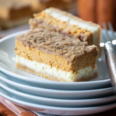 Delicious Pumpkin Cheesecake Bars #pumpkin #cheesecake #bars #pumpkinspice #fallbaking #fall #recipe #dessert