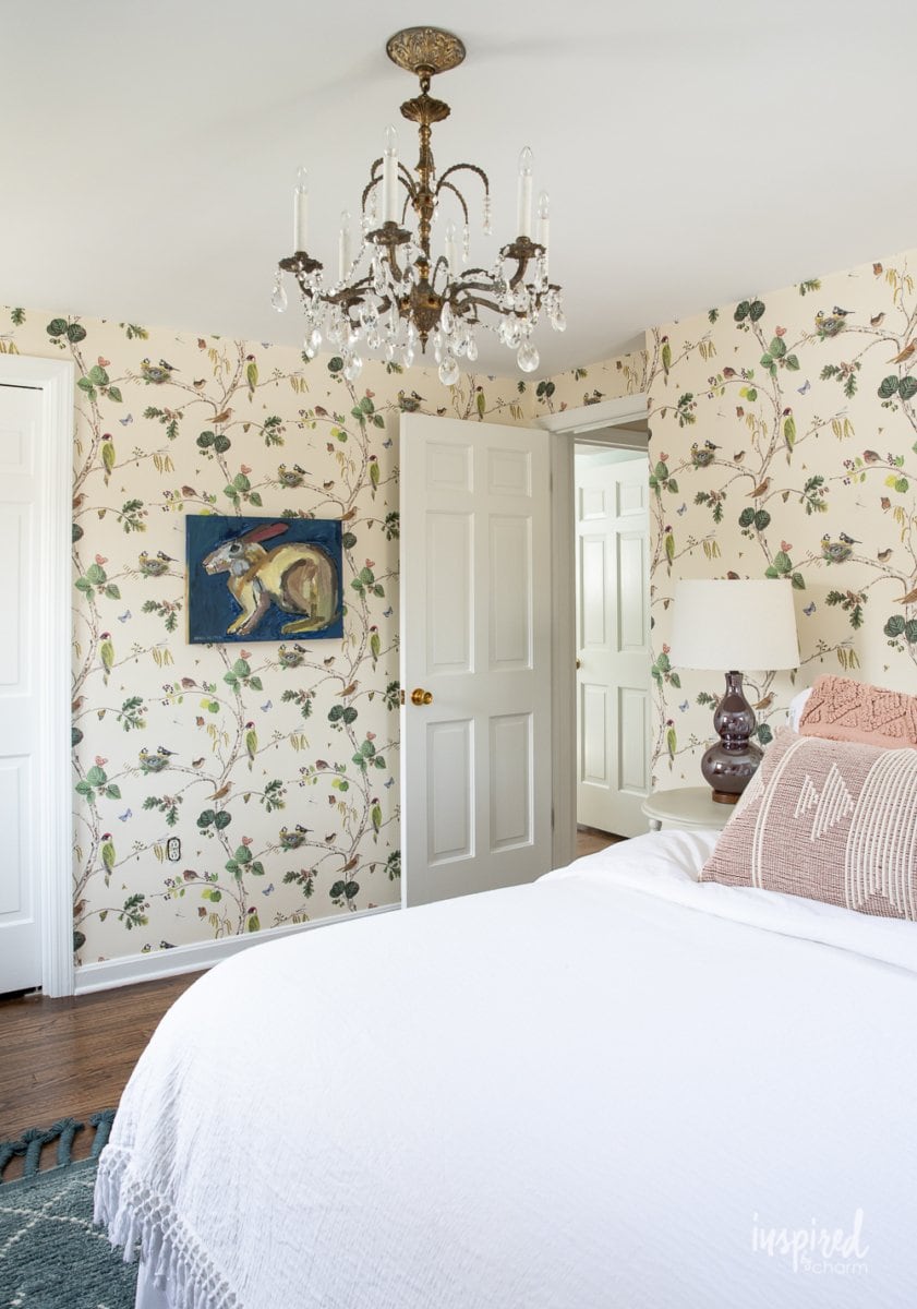 wallpaper bedroom with chandelier