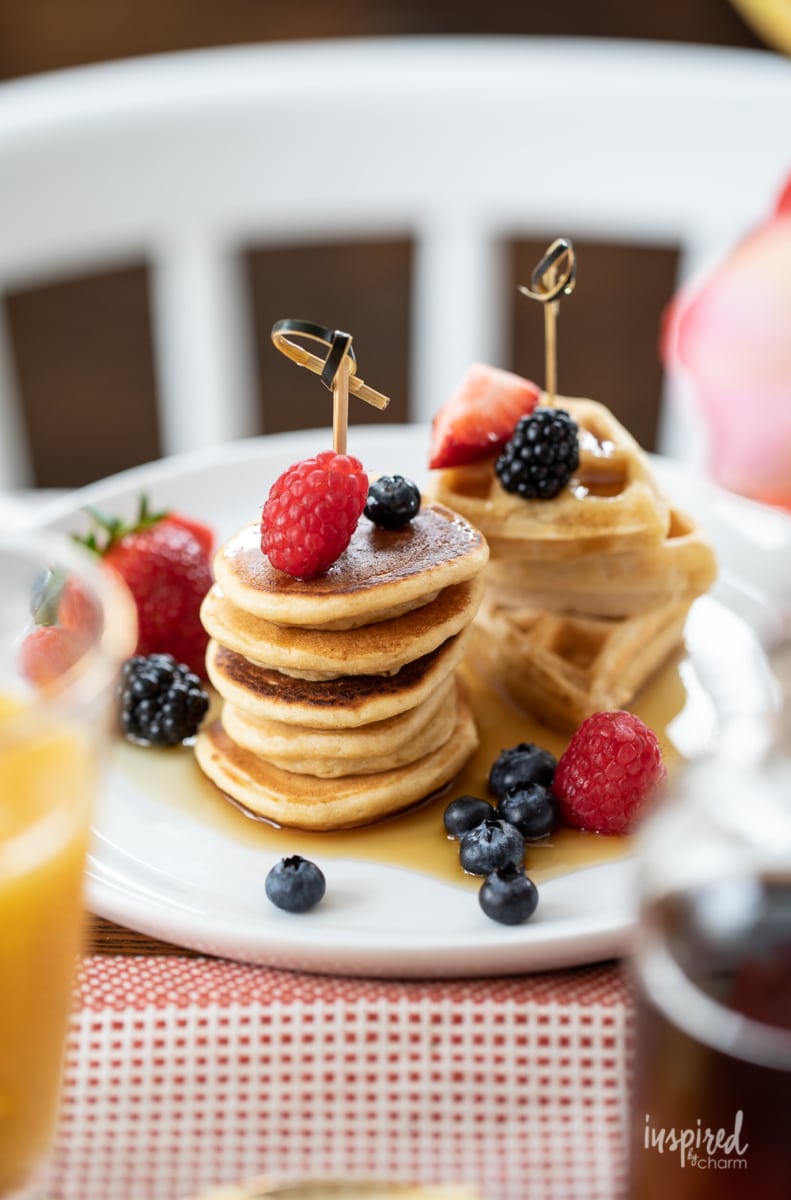 pancake and waffle stacks on a plate