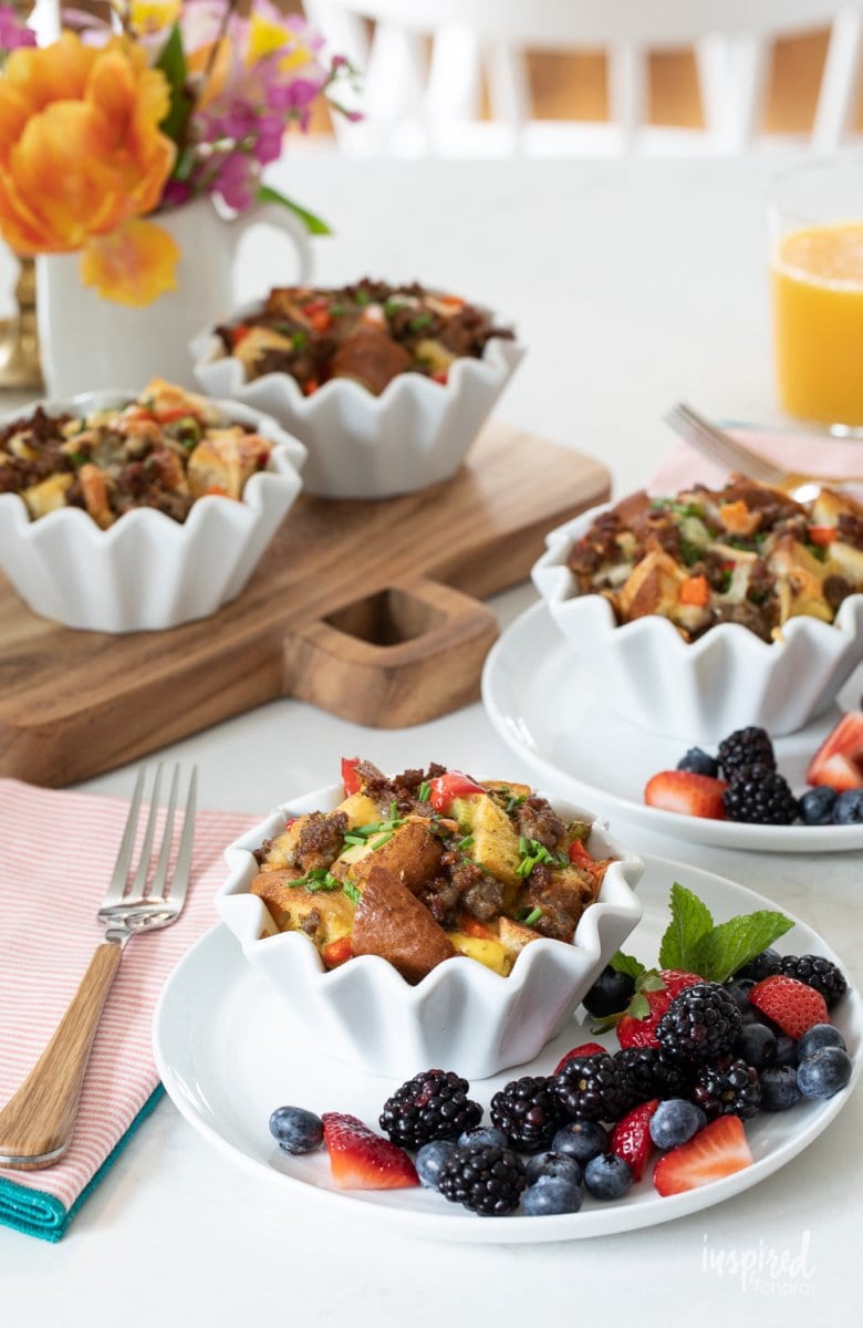 spread of Breakfast Strata Cups with berries
