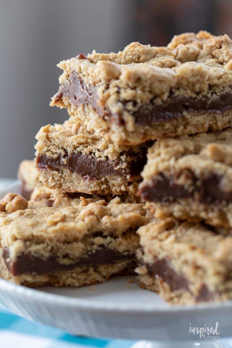 stack of Peanut Butter Oatmeal Fudge Bars on plate.