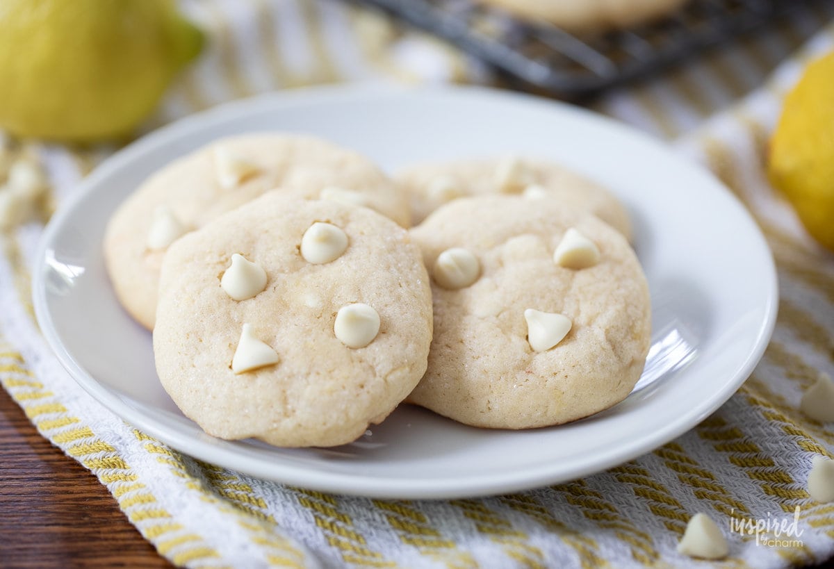 lemon and white chocolate cookies on a plate.