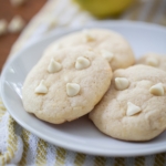 lemon cookies with white chocolate chips on a plate