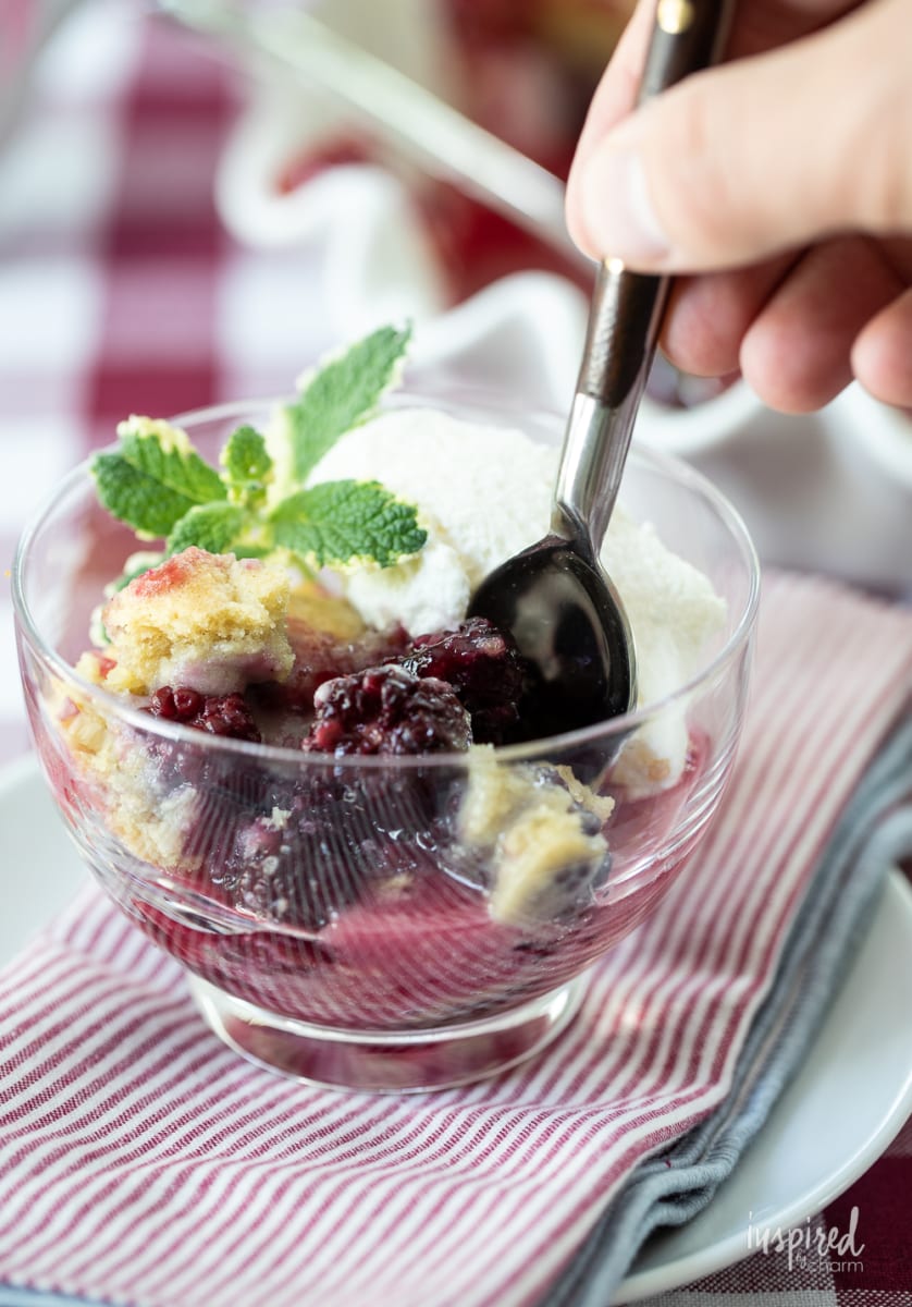 blackberry cobbler in glass bowl.
