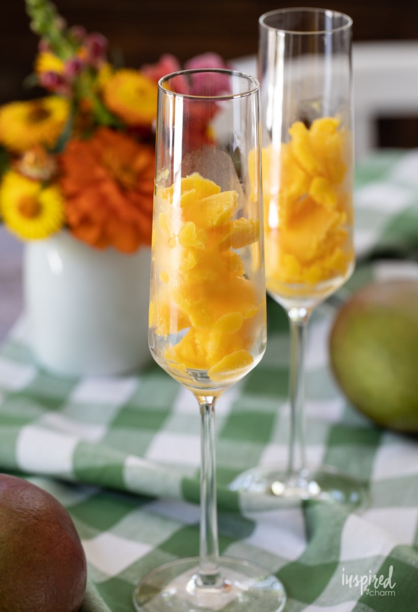 mango sorbet in champagne glasses.
