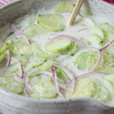 Creamed Cucumber Salad in bowl.