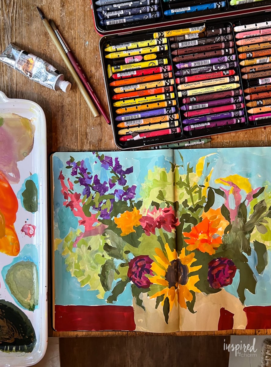 sketchbook with flower painting.