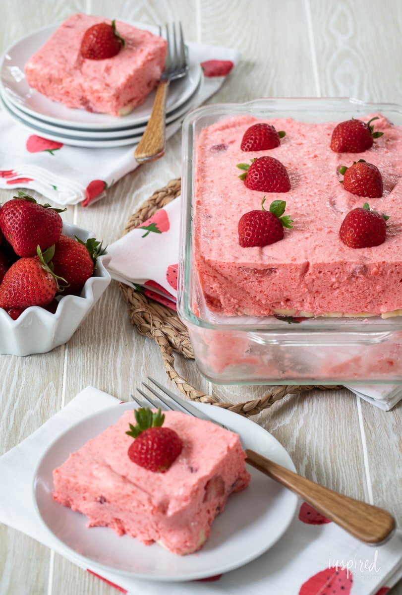 strawberry jello salad in pan and on plates.