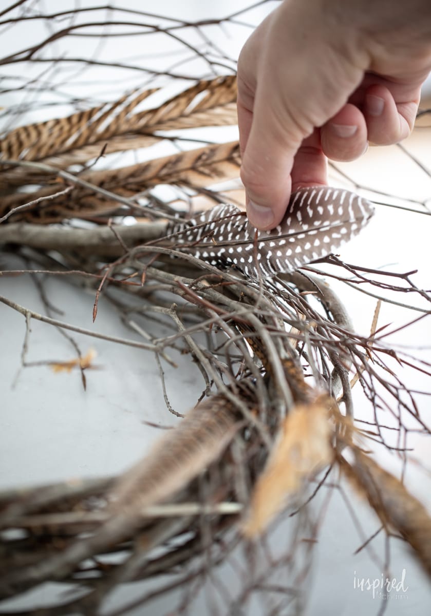 making a DIY Feather Wreath for Fall.