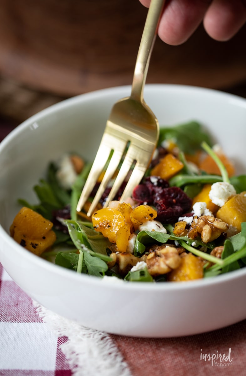 Butternut Squash Fall Salad Recipe in bowl with fork. 