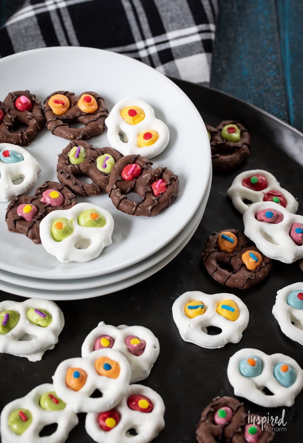 Spooky Halloween Pretzels for kids on a plate.