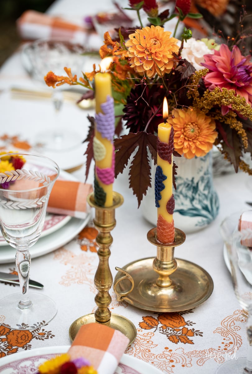 candles on fall table setting.