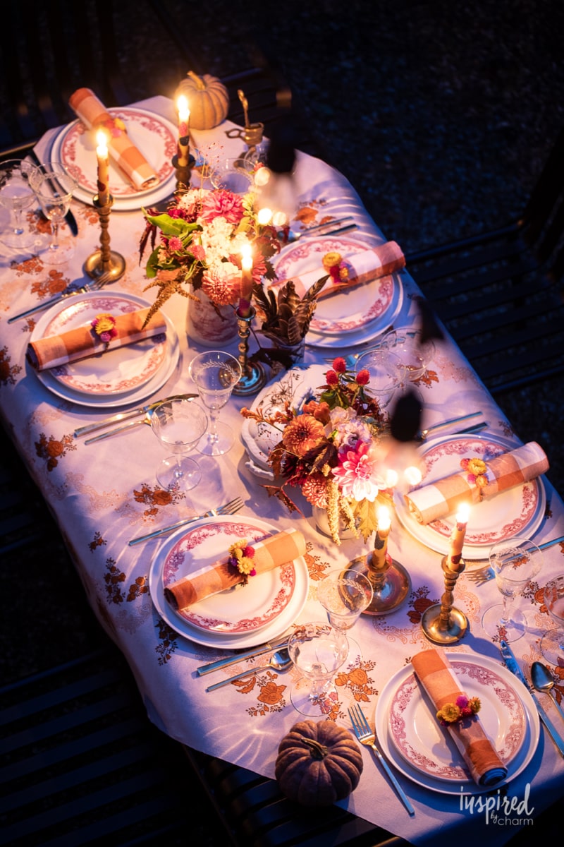 outdoor fall table setting at night.