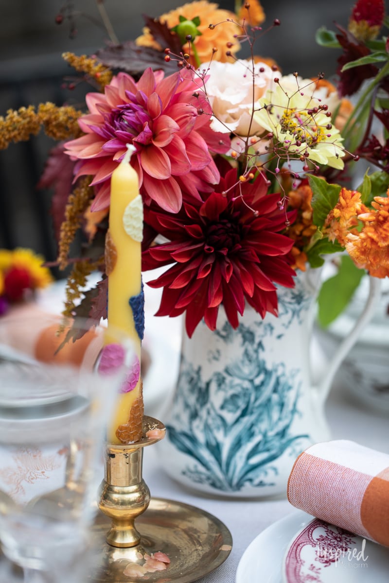 flower arrangement on fall table setting.