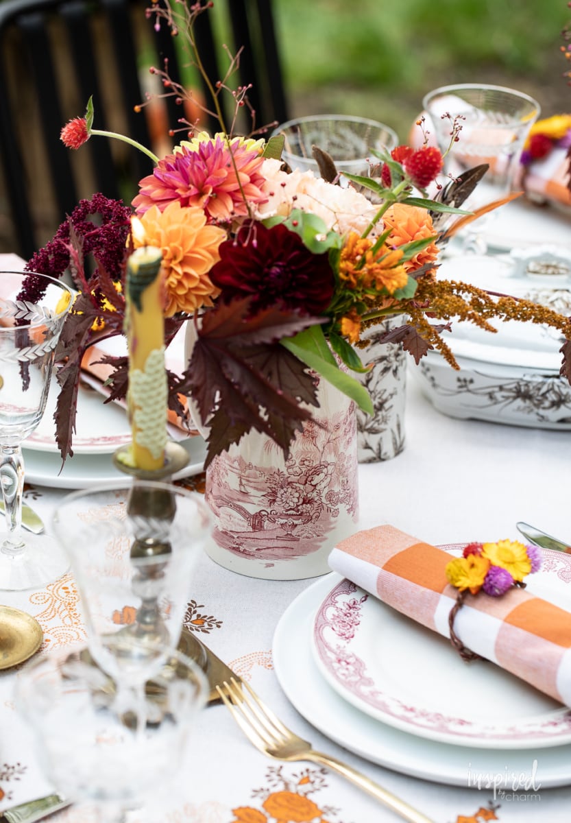flower vase on outdoor fall tablescape.