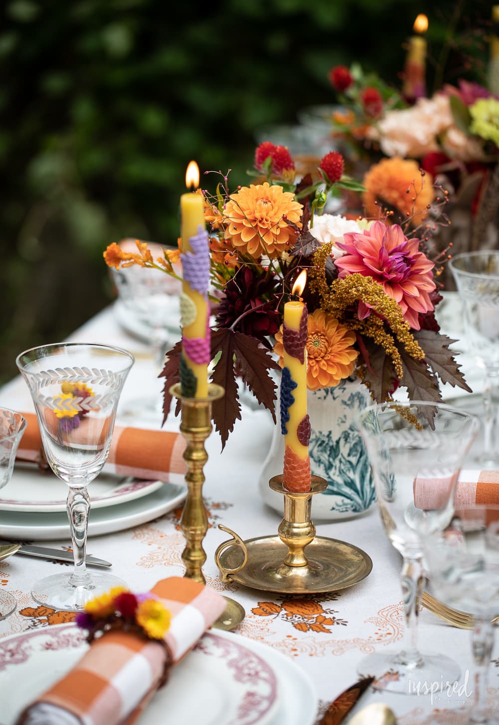 vintage-inspired all tablescape with candles and vintage glassware.
