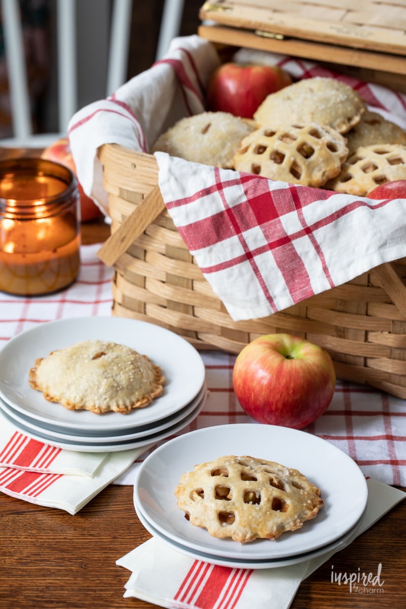 Salted Caramel Apple Hand Pies in picnic basket and on plates.