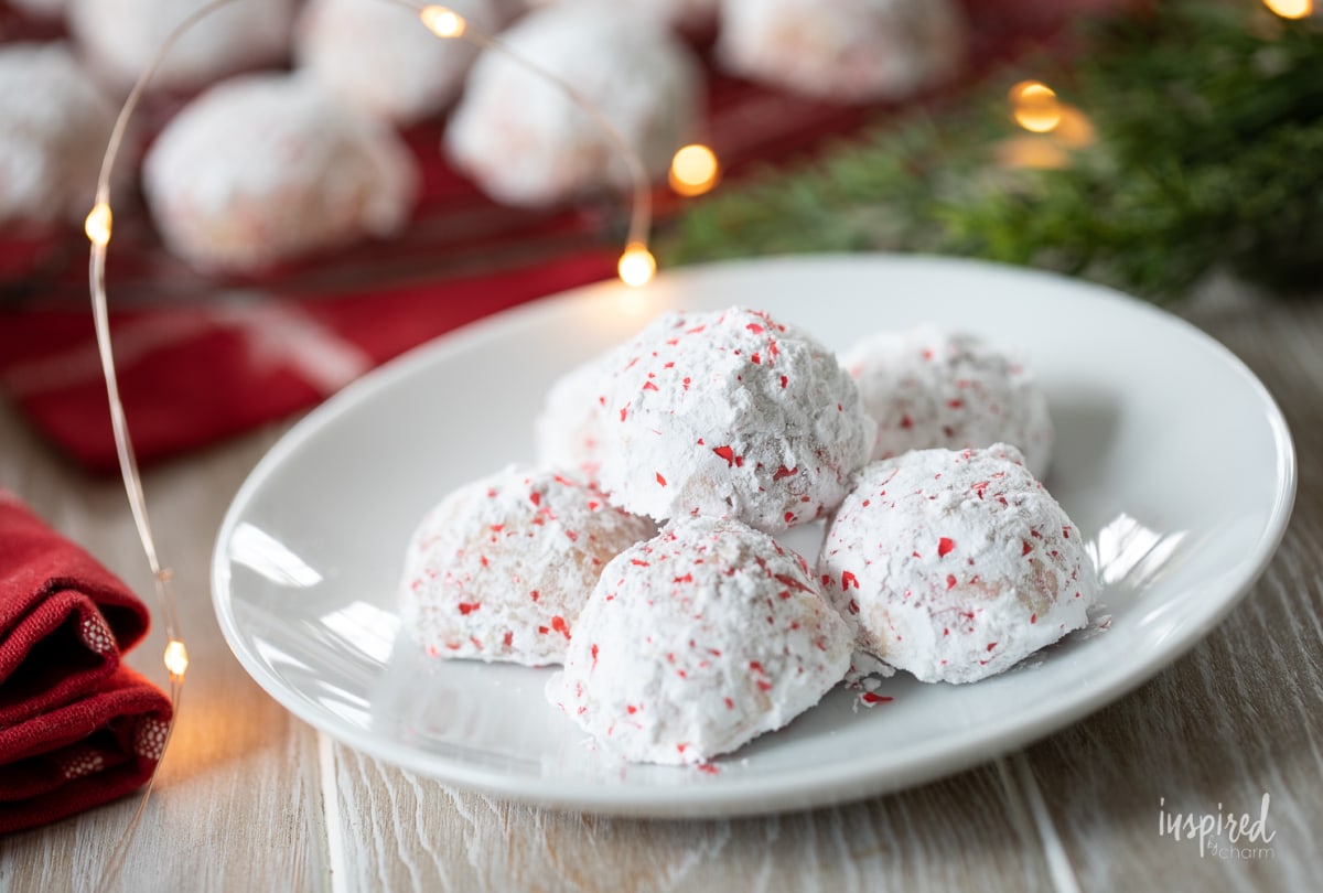 Cherry Walnut Snowball Cookies on a plate.