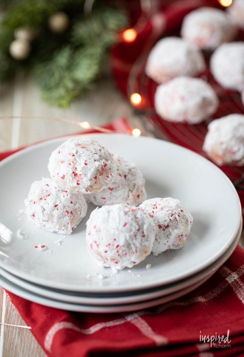 Cherry Walnut Snowball Cookies on a plate.