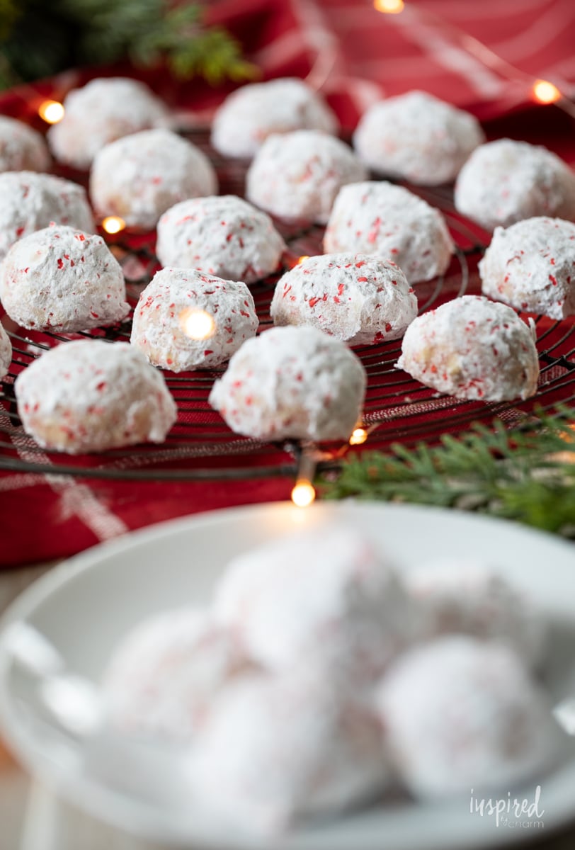 Cherry Walnut Snowball Cookies on a cooling rack.