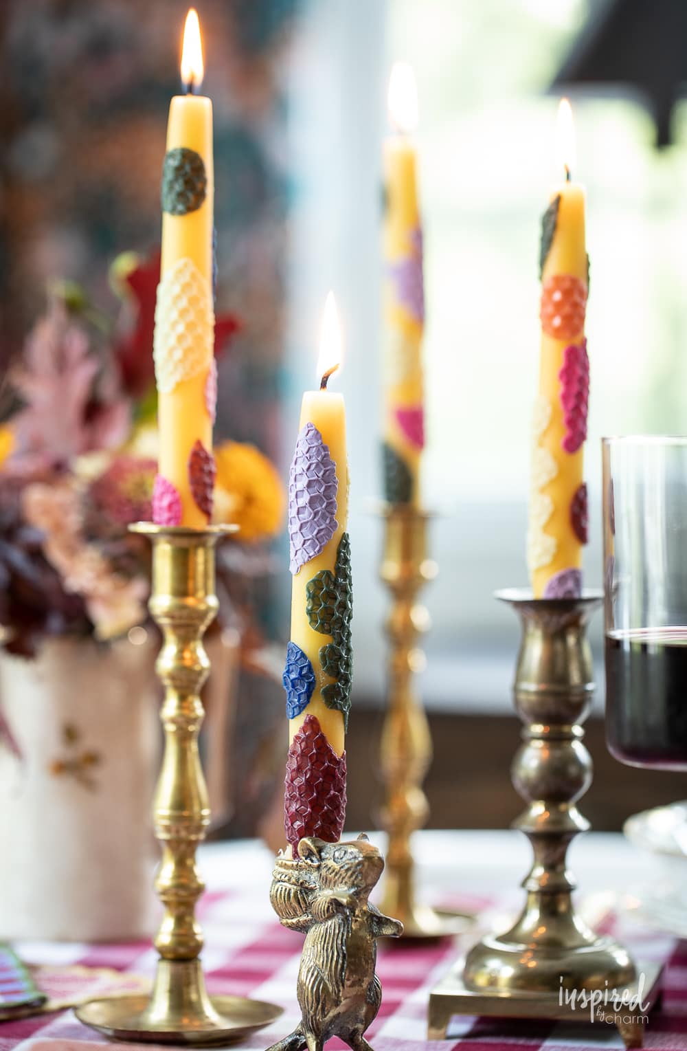 DIY Decorative Taper Candles in brass candlesticks.