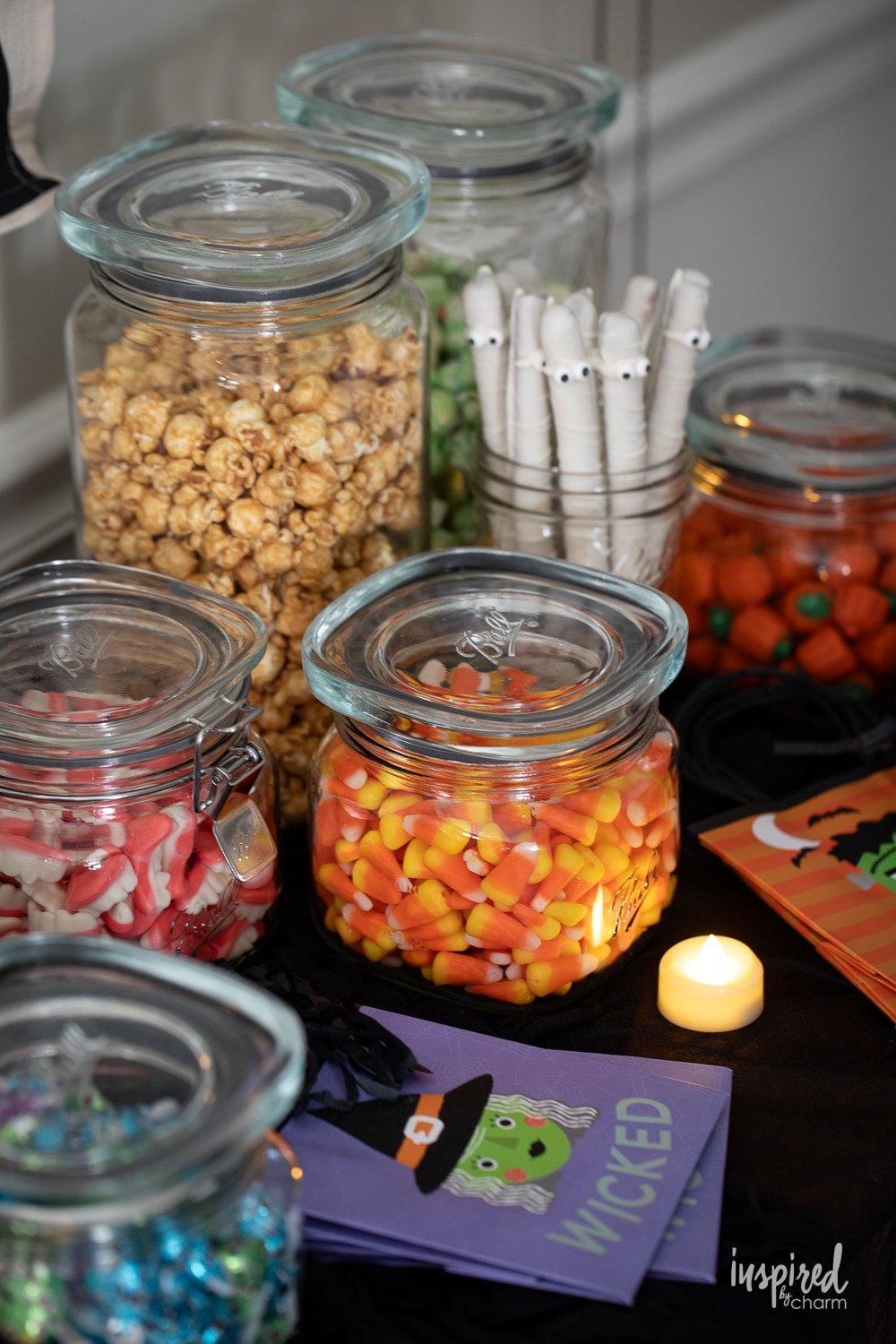 jars filled with halloween candy.