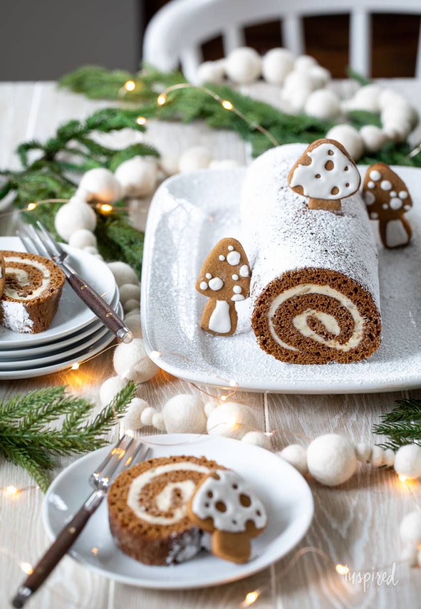 Gingerbread Swiss Cake Roll on a platter and plate.