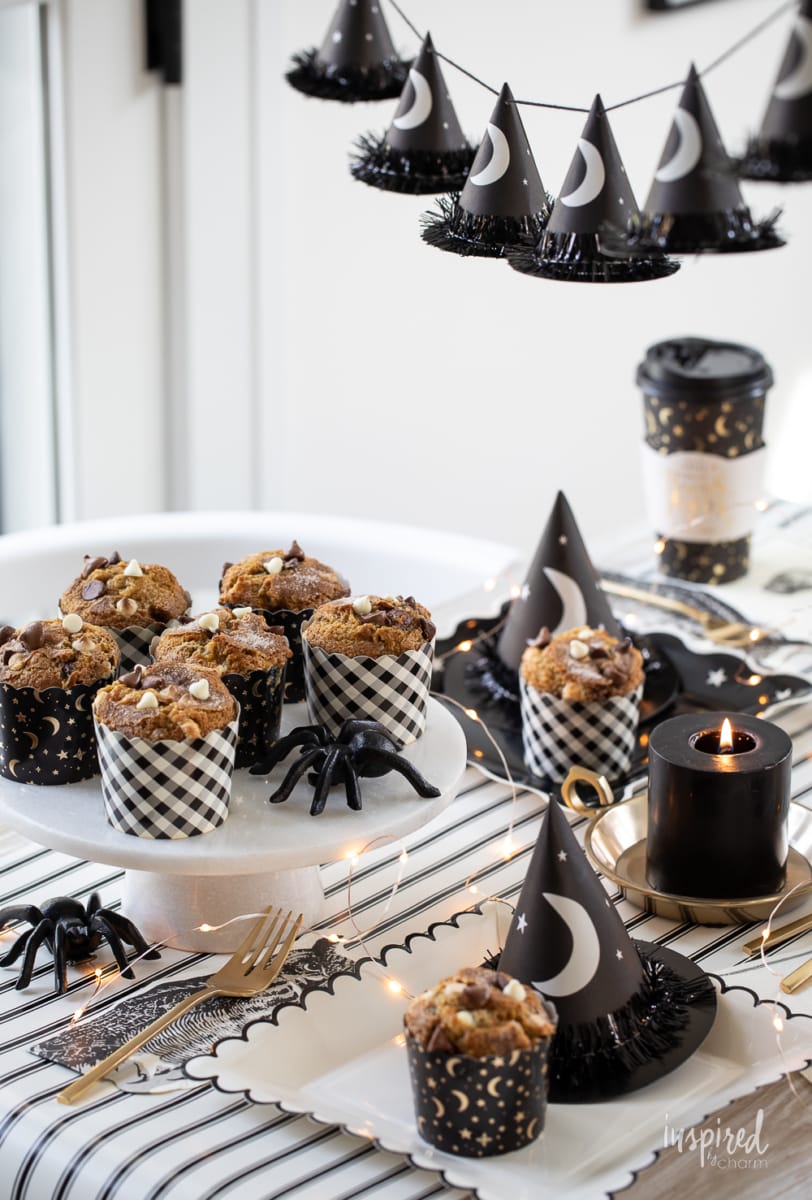 Chocolate Chip Pumpkin Muffins on Halloween decorated table.