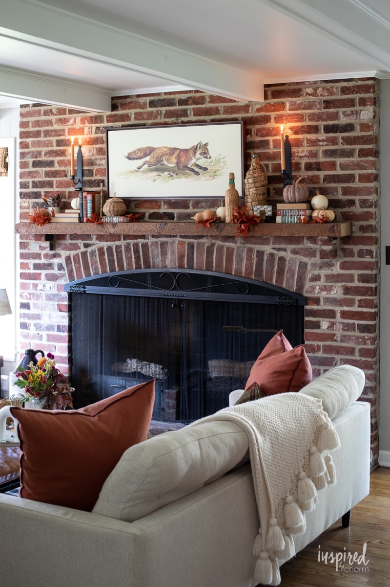 Modern English Brick Fireplace Decor - Taryn Whiteaker Designs