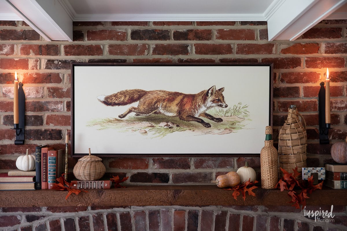 fox painting above fall mantel.