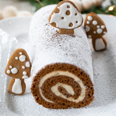 Gingerbread Swiss Cake Roll on a platter.