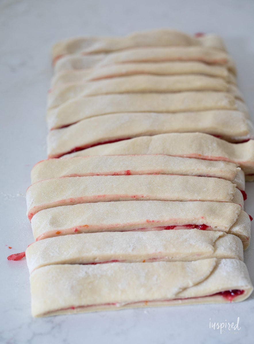 strips of dough with cranberry inside. 