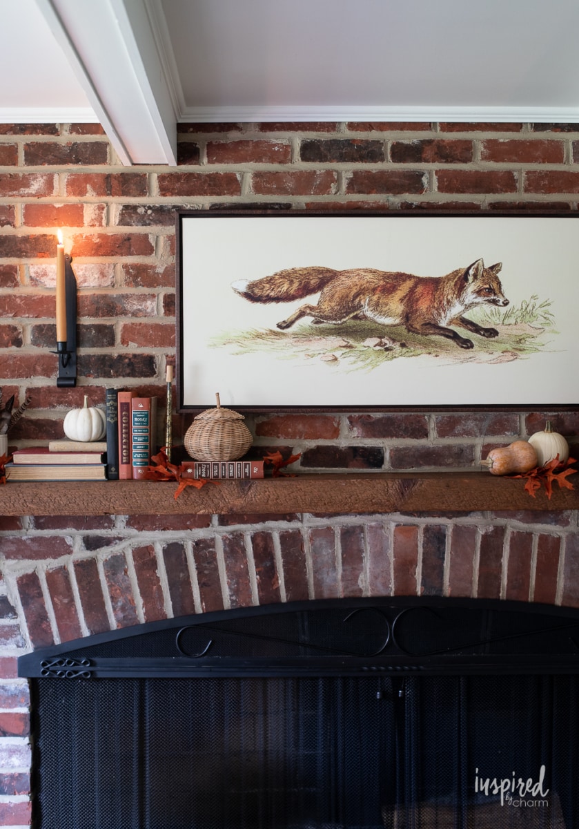 fox inspired fall mantel decor above sofa.