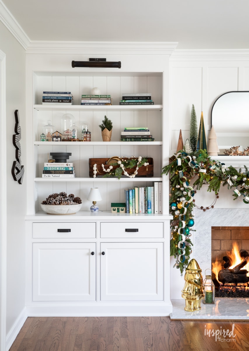 christmas decorating bookcase and mantel.