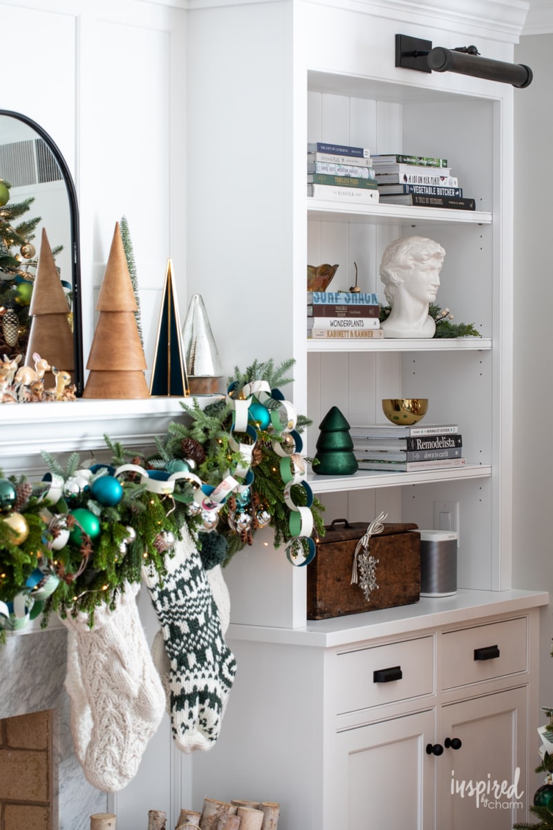 christmas mantel garland and bookcase.