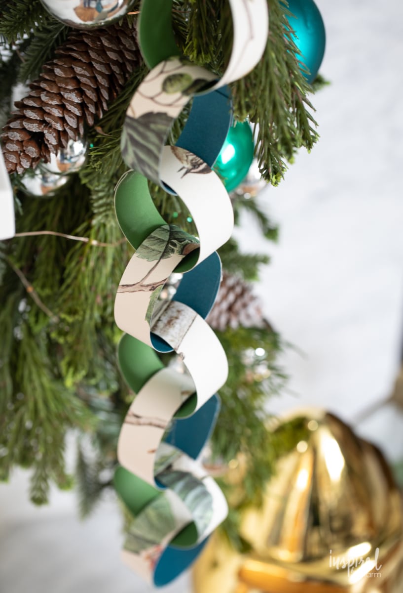paper chain for christmas hanging on a garland.