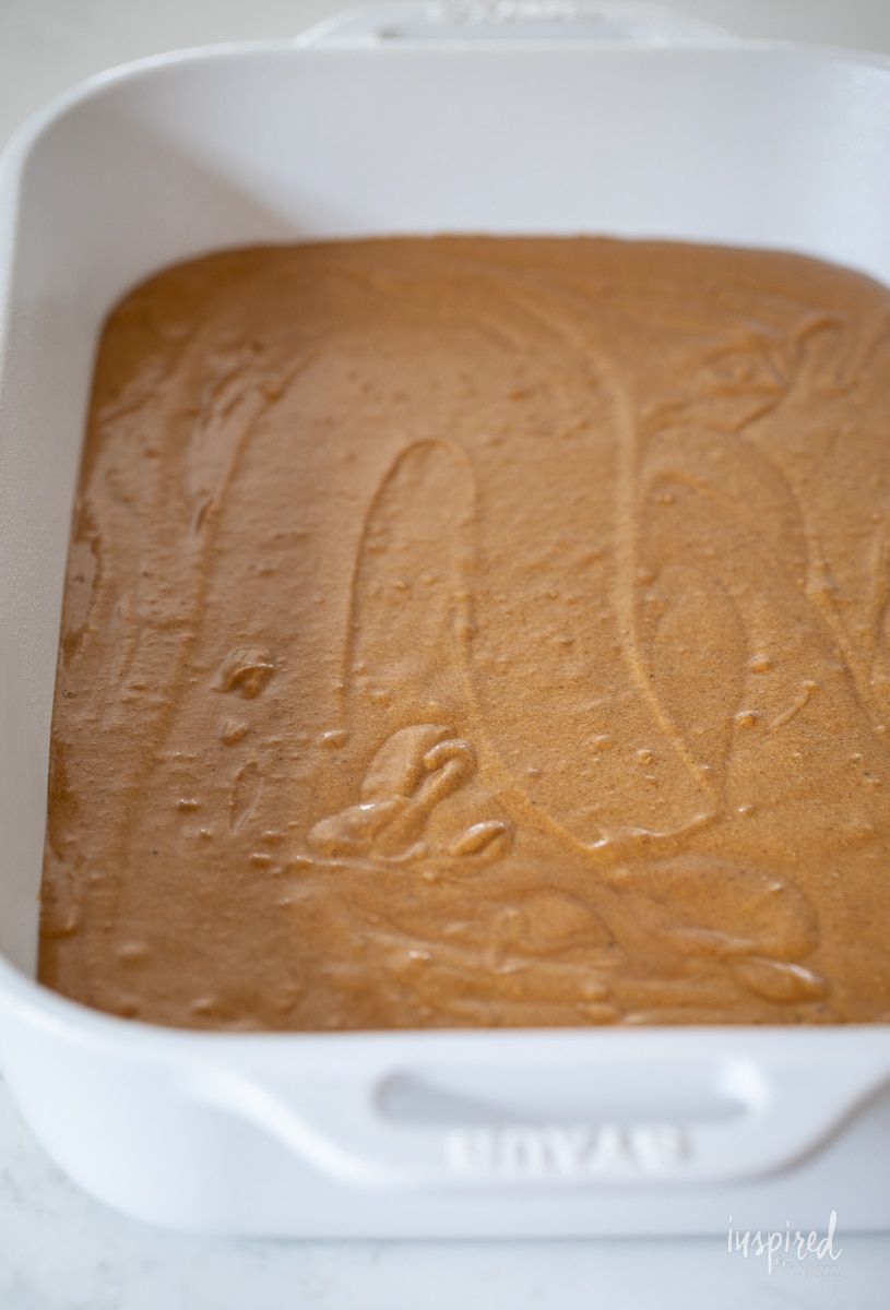gingerbread cake batter in pan.